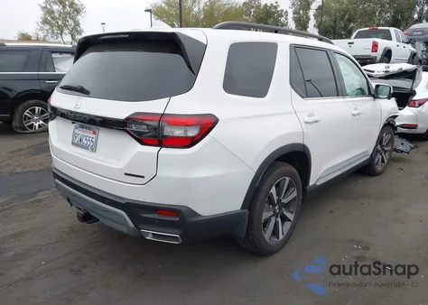 2025 Honda Pilot Touring z USA, uszkodzony, nr VIN 5FNYG1H72SB103673